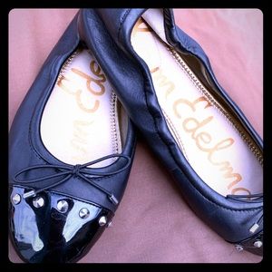 Black patent leather studded slip on